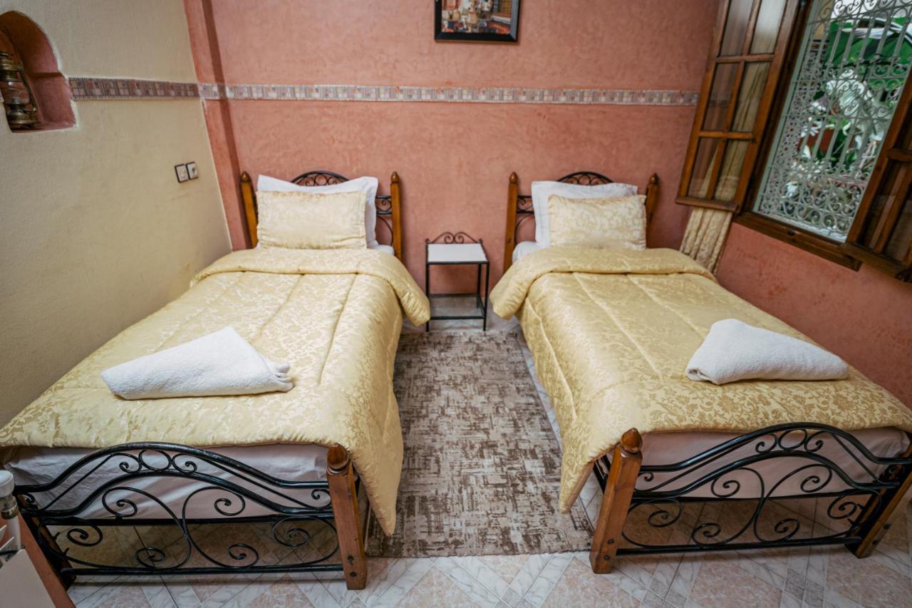 Hotel Faouzi Marrakesh Bagian luar foto