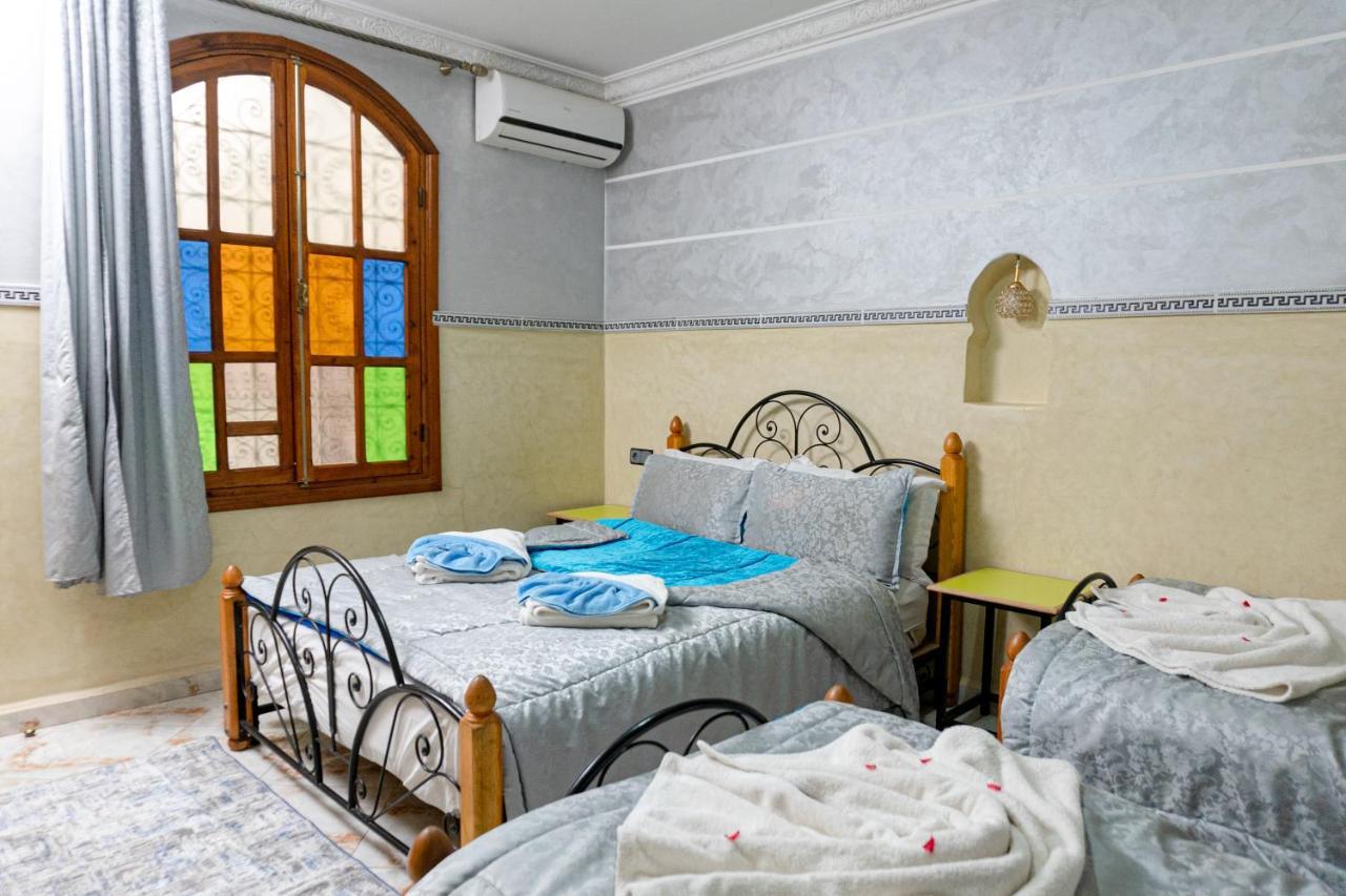 Hotel Faouzi Marrakesh Bagian luar foto