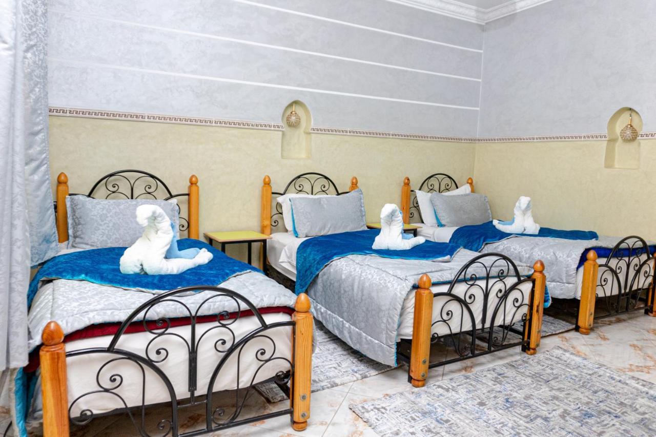 Hotel Faouzi Marrakesh Bagian luar foto