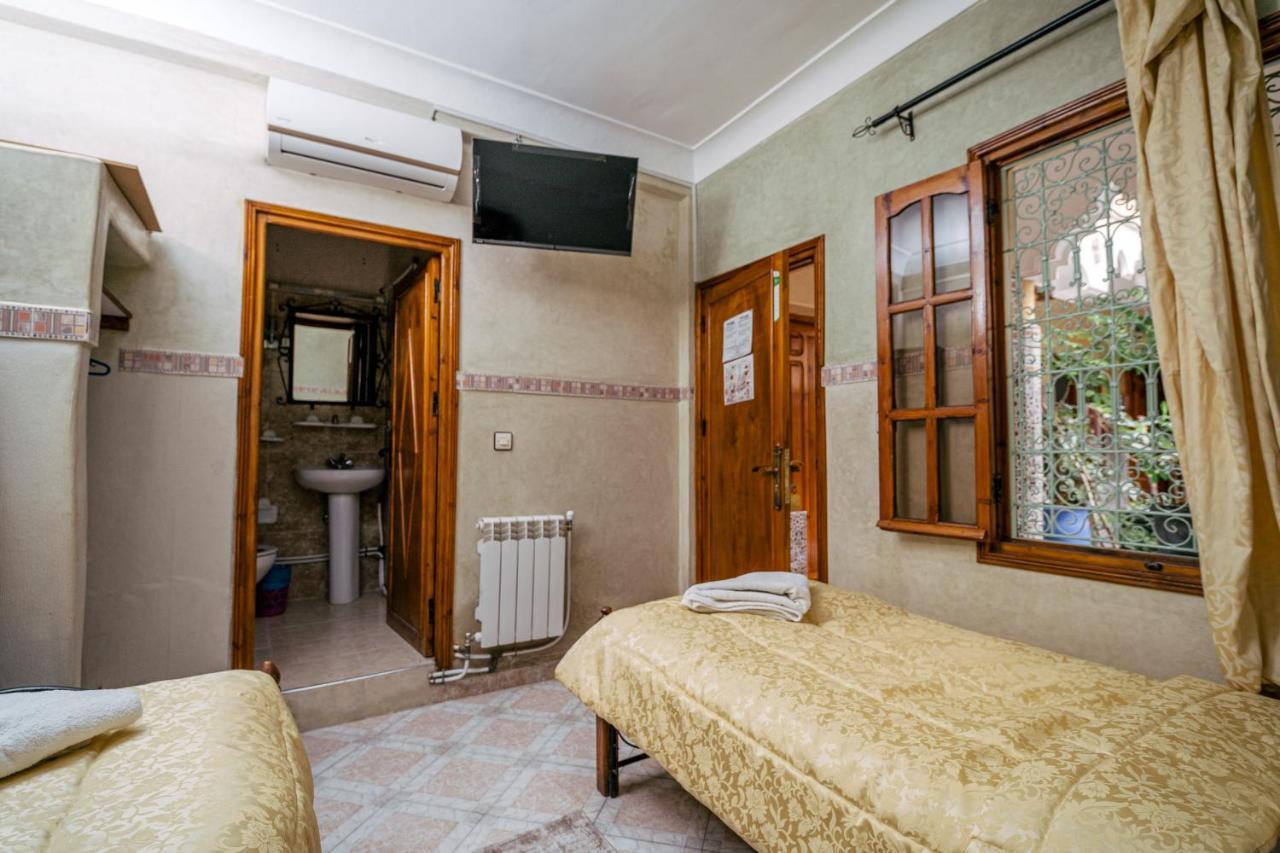 Hotel Faouzi Marrakesh Bagian luar foto
